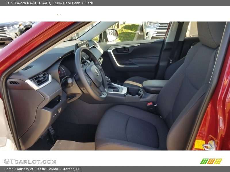 Ruby Flare Pearl / Black 2019 Toyota RAV4 LE AWD