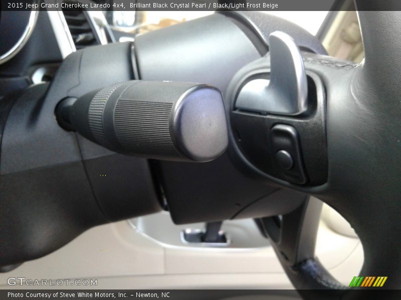Brilliant Black Crystal Pearl / Black/Light Frost Beige 2015 Jeep Grand Cherokee Laredo 4x4