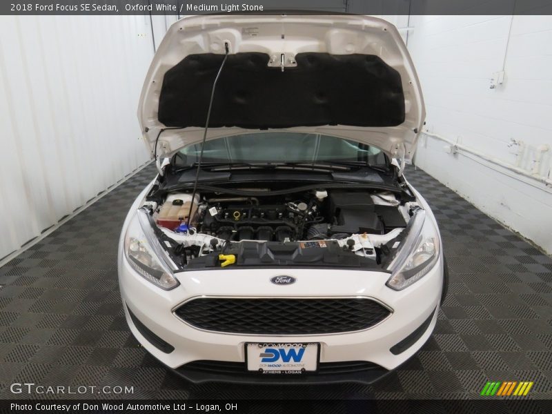 Oxford White / Medium Light Stone 2018 Ford Focus SE Sedan