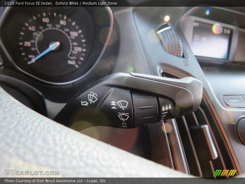 Oxford White / Medium Light Stone 2018 Ford Focus SE Sedan