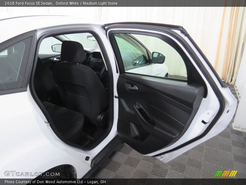Oxford White / Medium Light Stone 2018 Ford Focus SE Sedan