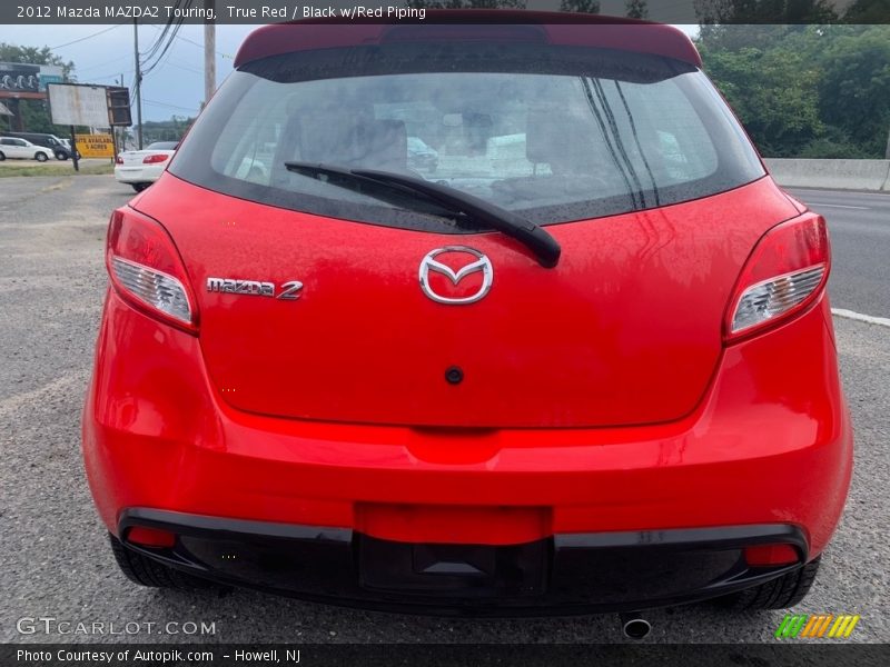 True Red / Black w/Red Piping 2012 Mazda MAZDA2 Touring