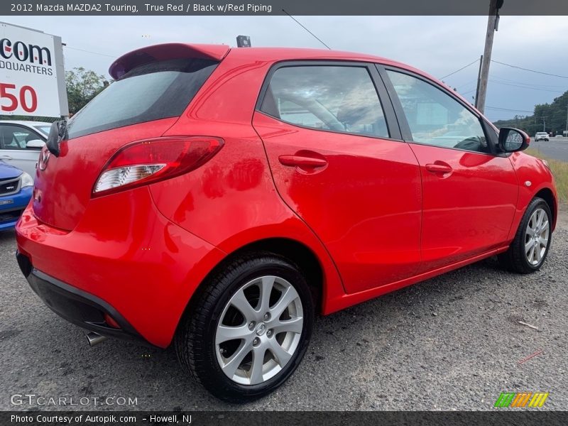 True Red / Black w/Red Piping 2012 Mazda MAZDA2 Touring