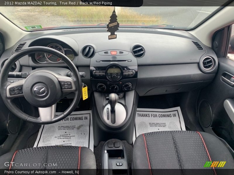 True Red / Black w/Red Piping 2012 Mazda MAZDA2 Touring