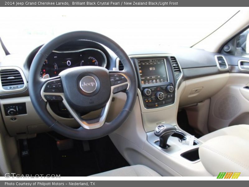 Brilliant Black Crystal Pearl / New Zealand Black/Light Frost 2014 Jeep Grand Cherokee Laredo