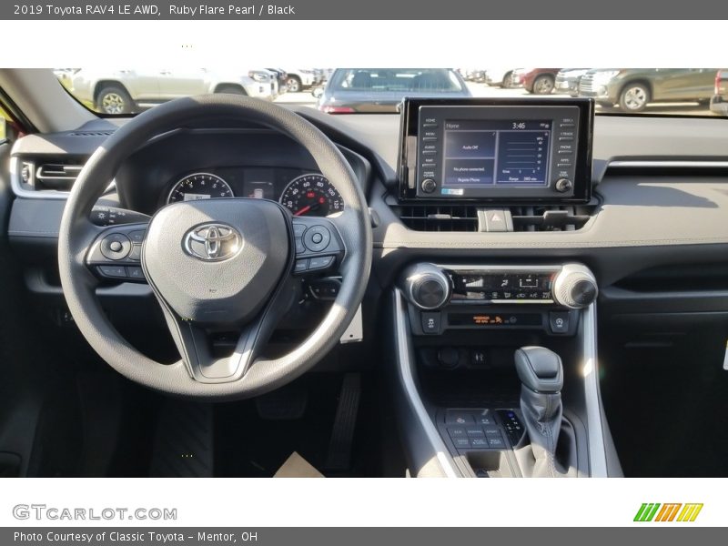 Ruby Flare Pearl / Black 2019 Toyota RAV4 LE AWD