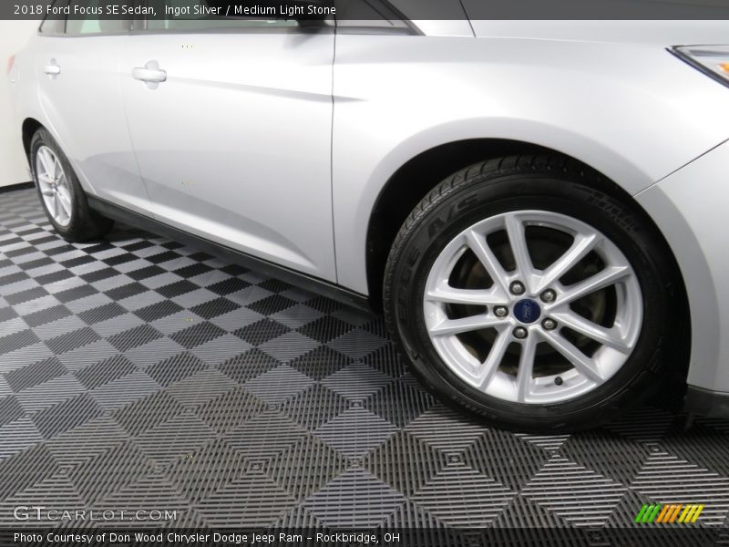 Ingot Silver / Medium Light Stone 2018 Ford Focus SE Sedan