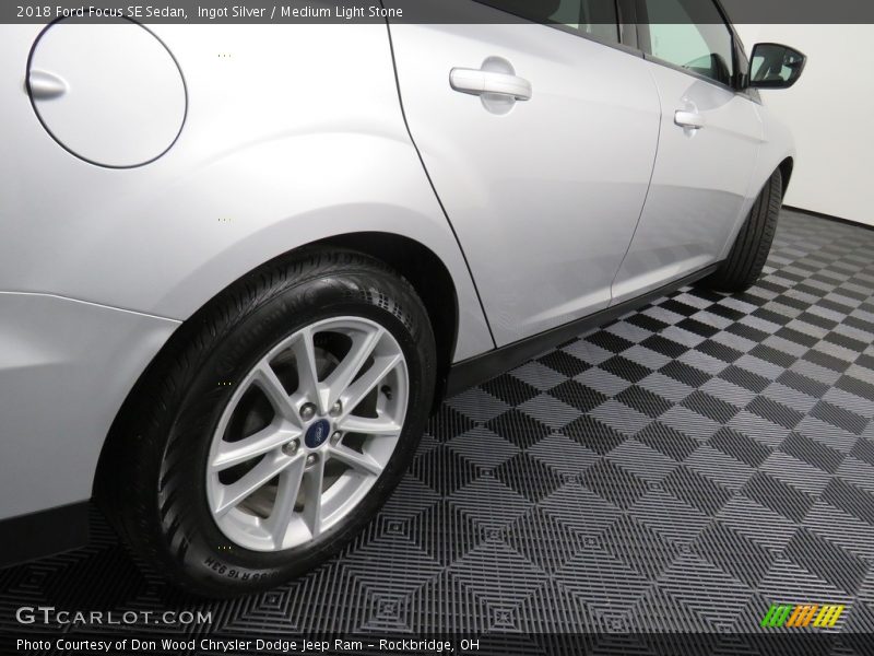 Ingot Silver / Medium Light Stone 2018 Ford Focus SE Sedan