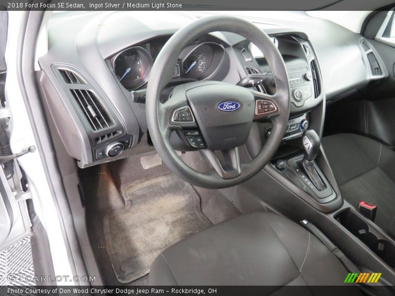 Ingot Silver / Medium Light Stone 2018 Ford Focus SE Sedan