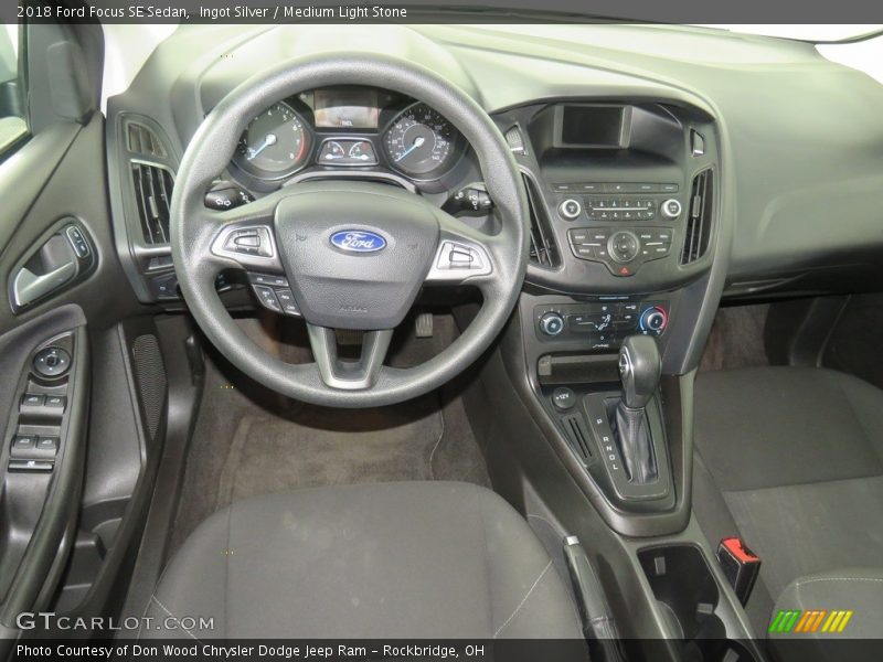 Ingot Silver / Medium Light Stone 2018 Ford Focus SE Sedan