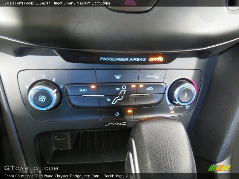 Ingot Silver / Medium Light Stone 2018 Ford Focus SE Sedan