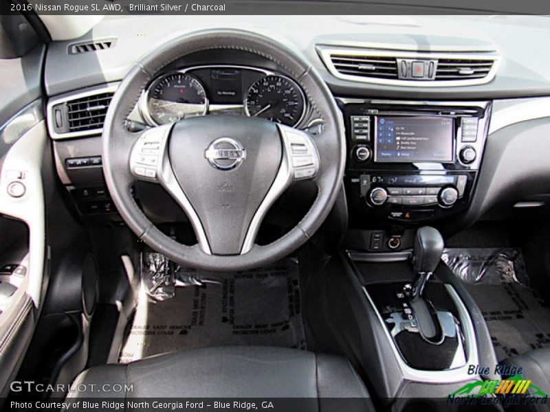 Brilliant Silver / Charcoal 2016 Nissan Rogue SL AWD