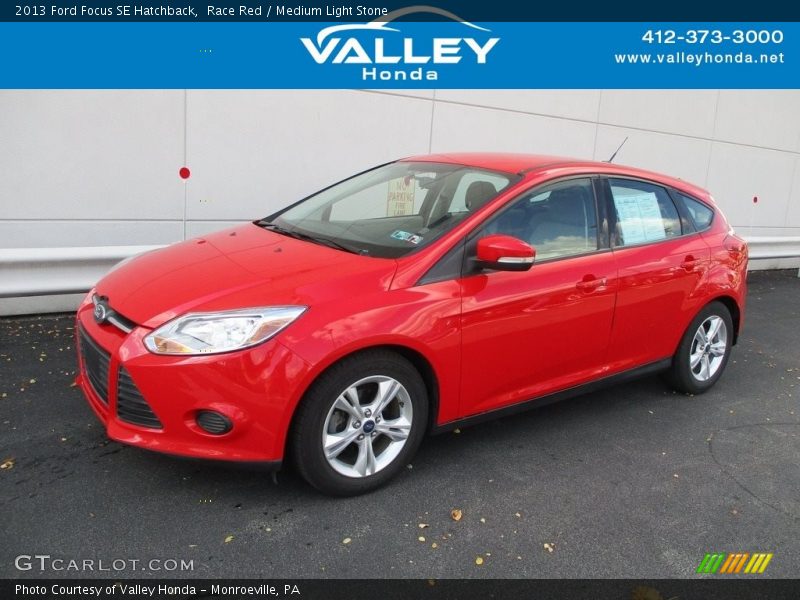 Race Red / Medium Light Stone 2013 Ford Focus SE Hatchback