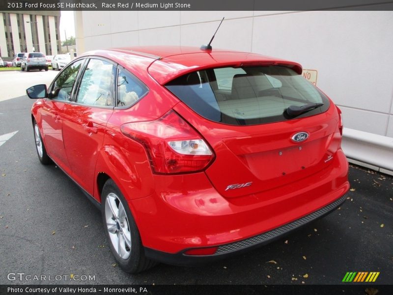 Race Red / Medium Light Stone 2013 Ford Focus SE Hatchback