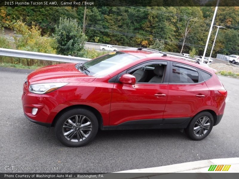Garnet Red / Beige 2015 Hyundai Tucson SE AWD