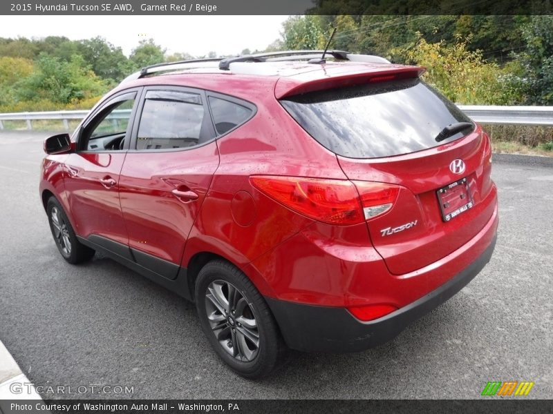 Garnet Red / Beige 2015 Hyundai Tucson SE AWD