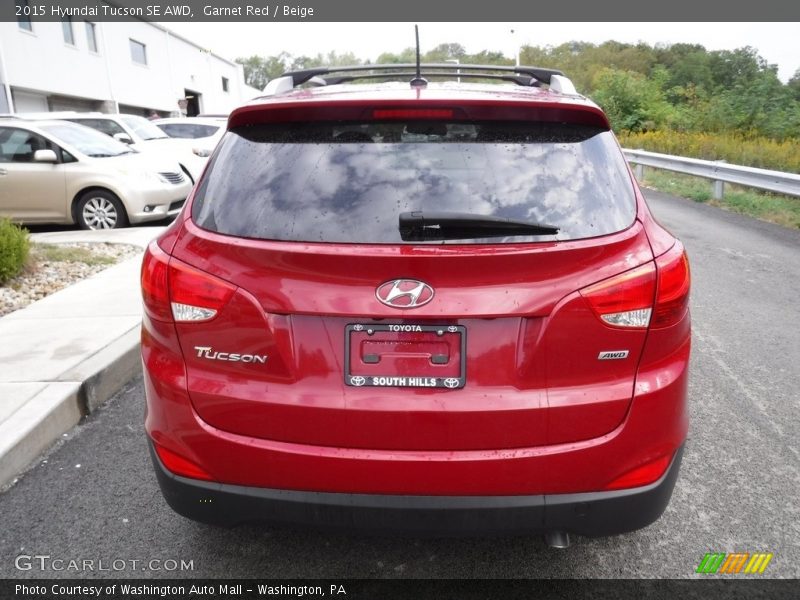 Garnet Red / Beige 2015 Hyundai Tucson SE AWD