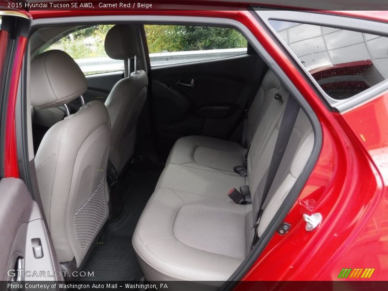 Garnet Red / Beige 2015 Hyundai Tucson SE AWD