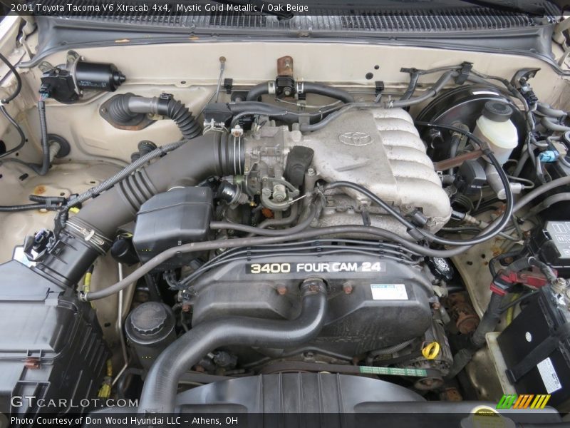 Mystic Gold Metallic / Oak Beige 2001 Toyota Tacoma V6 Xtracab 4x4
