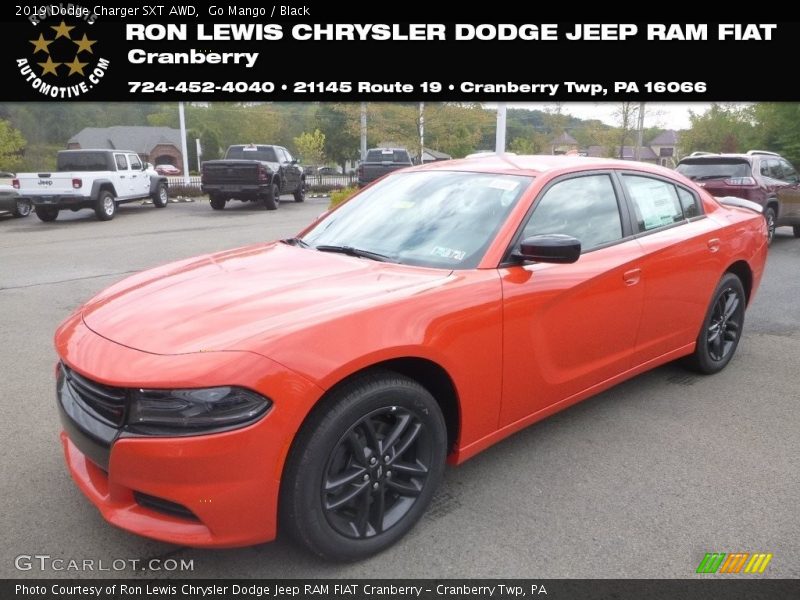 Go Mango / Black 2019 Dodge Charger SXT AWD