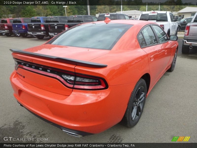 Go Mango / Black 2019 Dodge Charger SXT AWD