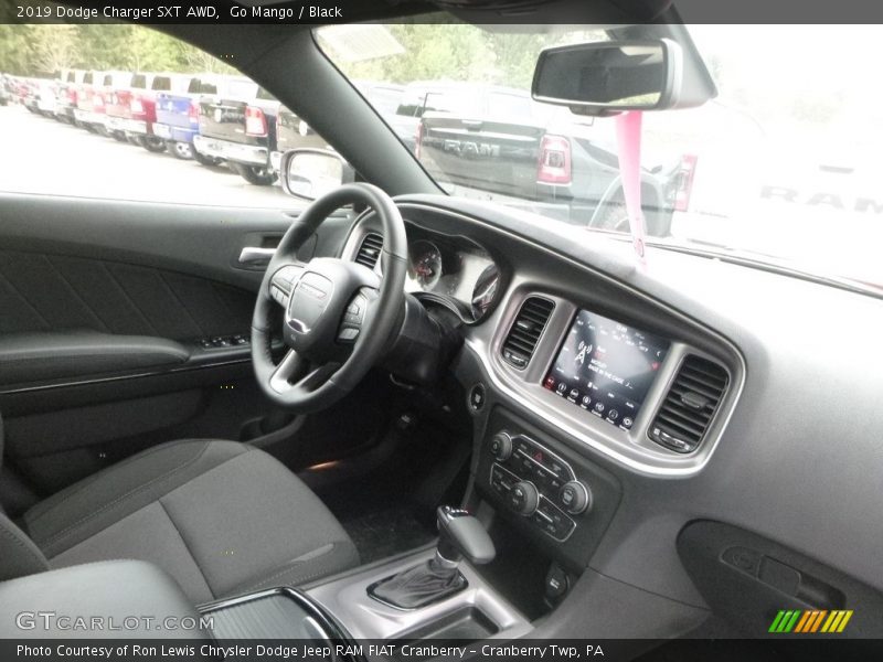 Go Mango / Black 2019 Dodge Charger SXT AWD