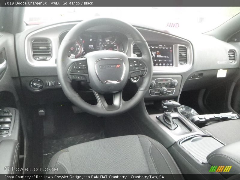 Go Mango / Black 2019 Dodge Charger SXT AWD