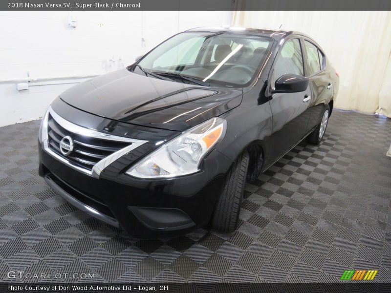 Super Black / Charcoal 2018 Nissan Versa SV