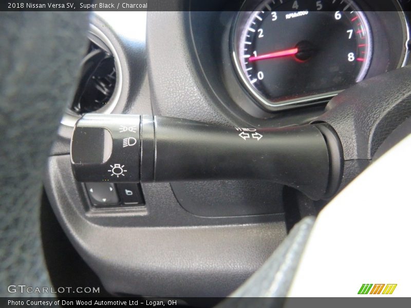 Super Black / Charcoal 2018 Nissan Versa SV