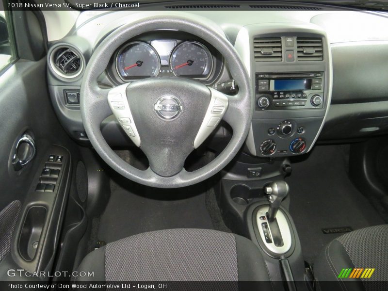 Super Black / Charcoal 2018 Nissan Versa SV