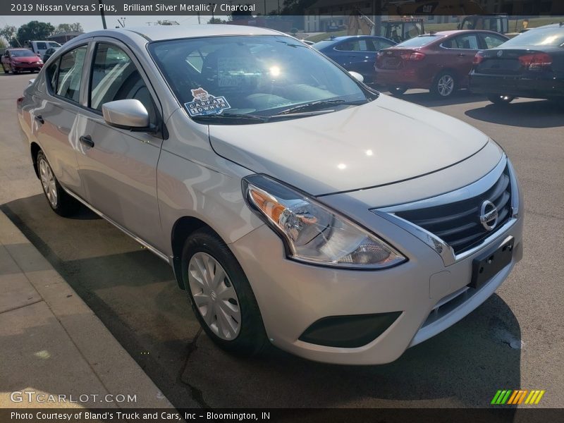 Brilliant Silver Metallic / Charcoal 2019 Nissan Versa S Plus