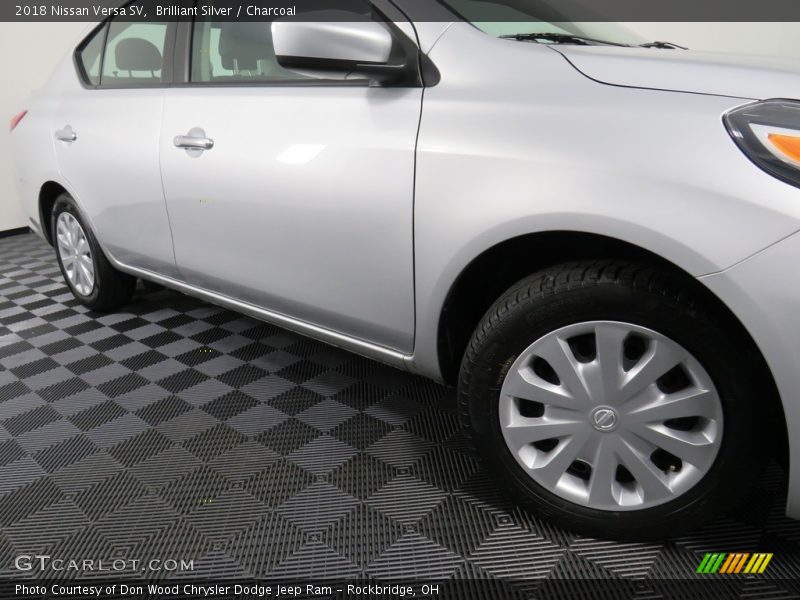 Brilliant Silver / Charcoal 2018 Nissan Versa SV