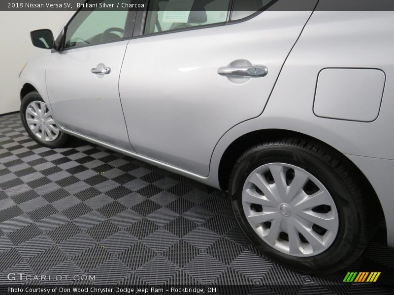 Brilliant Silver / Charcoal 2018 Nissan Versa SV