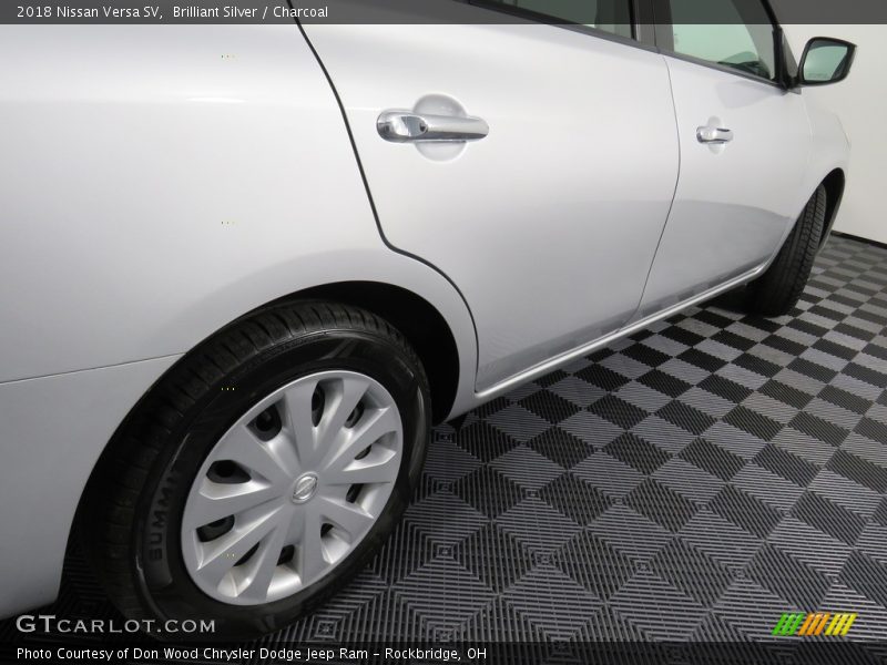 Brilliant Silver / Charcoal 2018 Nissan Versa SV