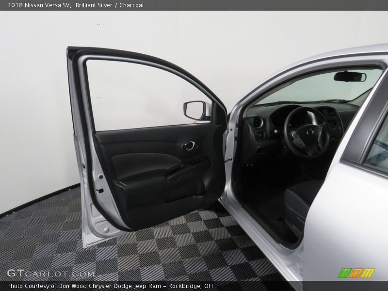Brilliant Silver / Charcoal 2018 Nissan Versa SV