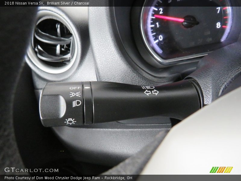 Brilliant Silver / Charcoal 2018 Nissan Versa SV