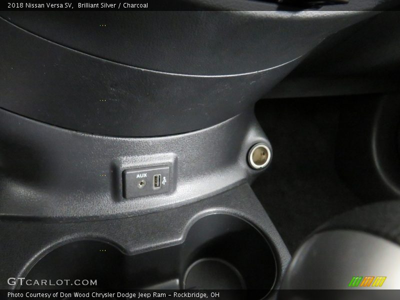 Brilliant Silver / Charcoal 2018 Nissan Versa SV