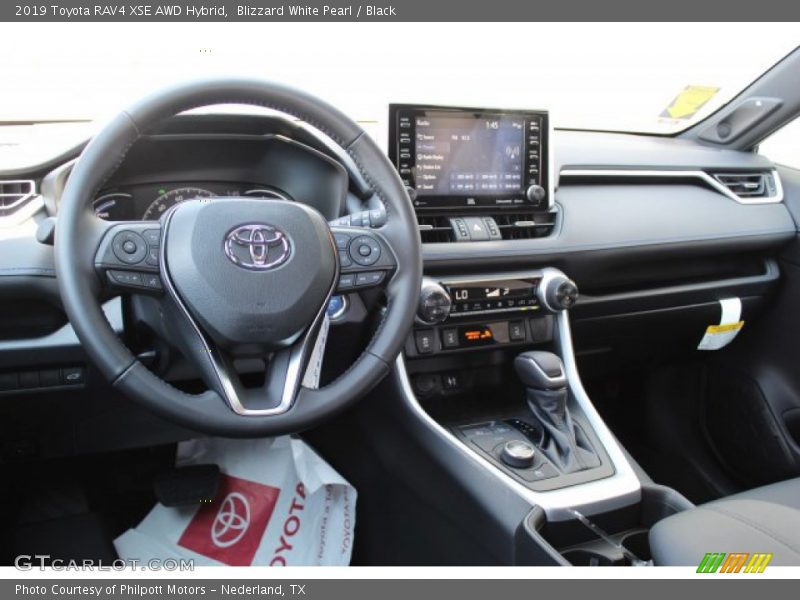 Blizzard White Pearl / Black 2019 Toyota RAV4 XSE AWD Hybrid