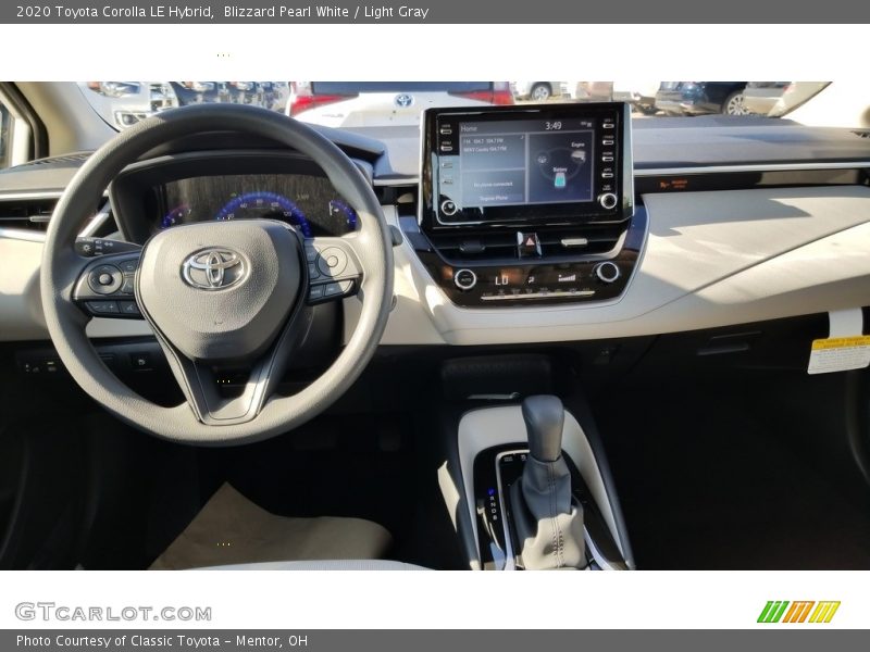 Blizzard Pearl White / Light Gray 2020 Toyota Corolla LE Hybrid