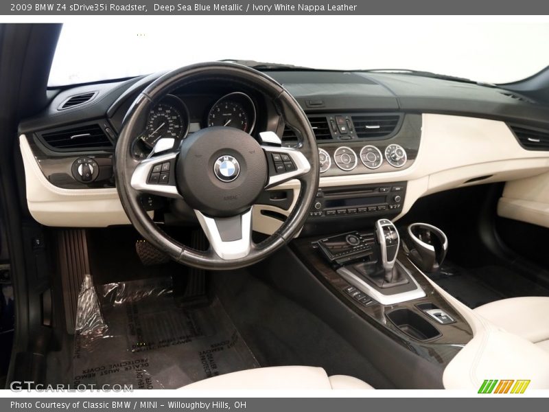 Deep Sea Blue Metallic / Ivory White Nappa Leather 2009 BMW Z4 sDrive35i Roadster