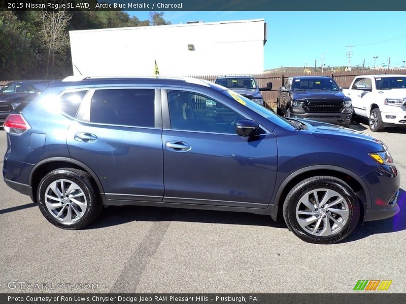 Arctic Blue Metallic / Charcoal 2015 Nissan Rogue SL AWD