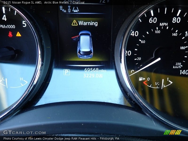 Arctic Blue Metallic / Charcoal 2015 Nissan Rogue SL AWD