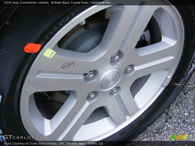 Brilliant Black Crystal Pearl / Saddle Brown 2009 Jeep Commander Limited