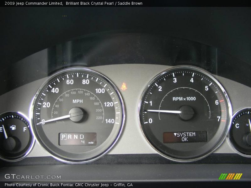 Brilliant Black Crystal Pearl / Saddle Brown 2009 Jeep Commander Limited