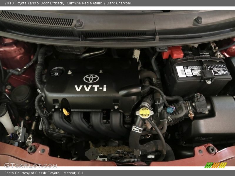 Carmine Red Metallic / Dark Charcoal 2010 Toyota Yaris 5 Door Liftback