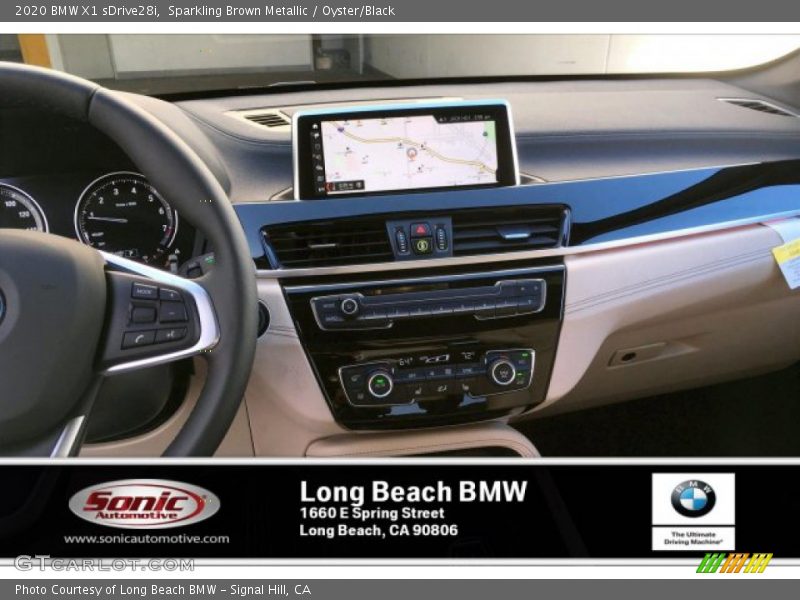 Sparkling Brown Metallic / Oyster/Black 2020 BMW X1 sDrive28i