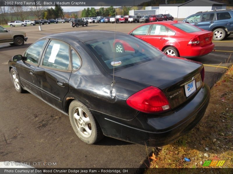 Black / Medium Graphite 2002 Ford Taurus SE