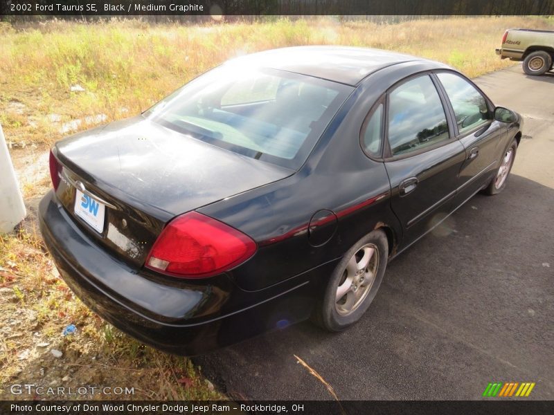 Black / Medium Graphite 2002 Ford Taurus SE