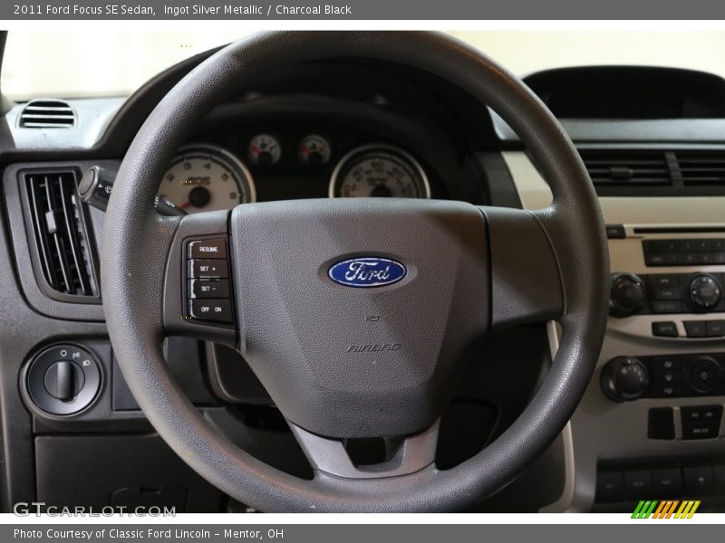 Ingot Silver Metallic / Charcoal Black 2011 Ford Focus SE Sedan