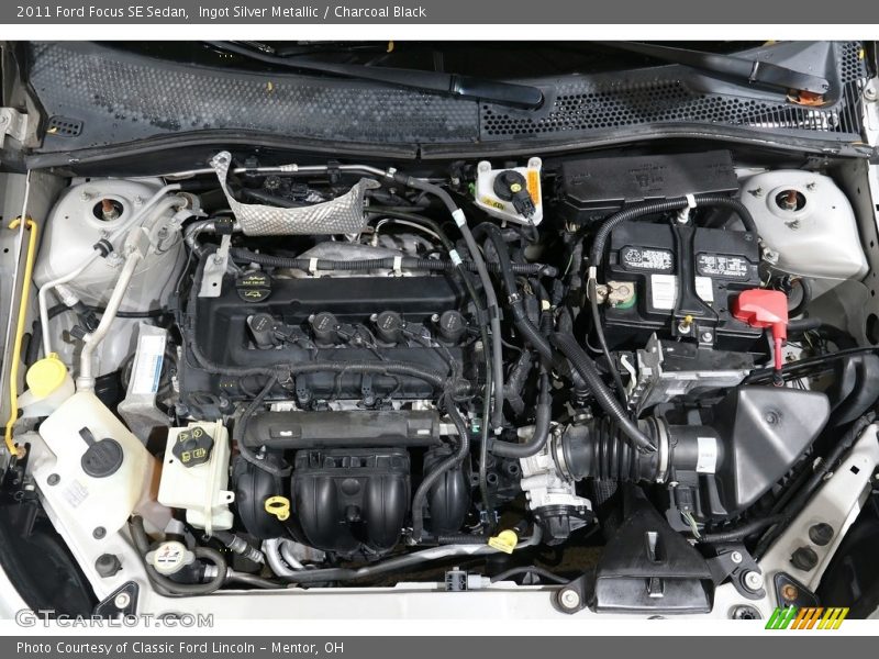 Ingot Silver Metallic / Charcoal Black 2011 Ford Focus SE Sedan